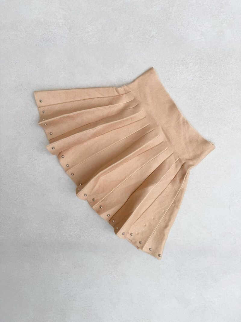 I108 - Pollera c/tachas