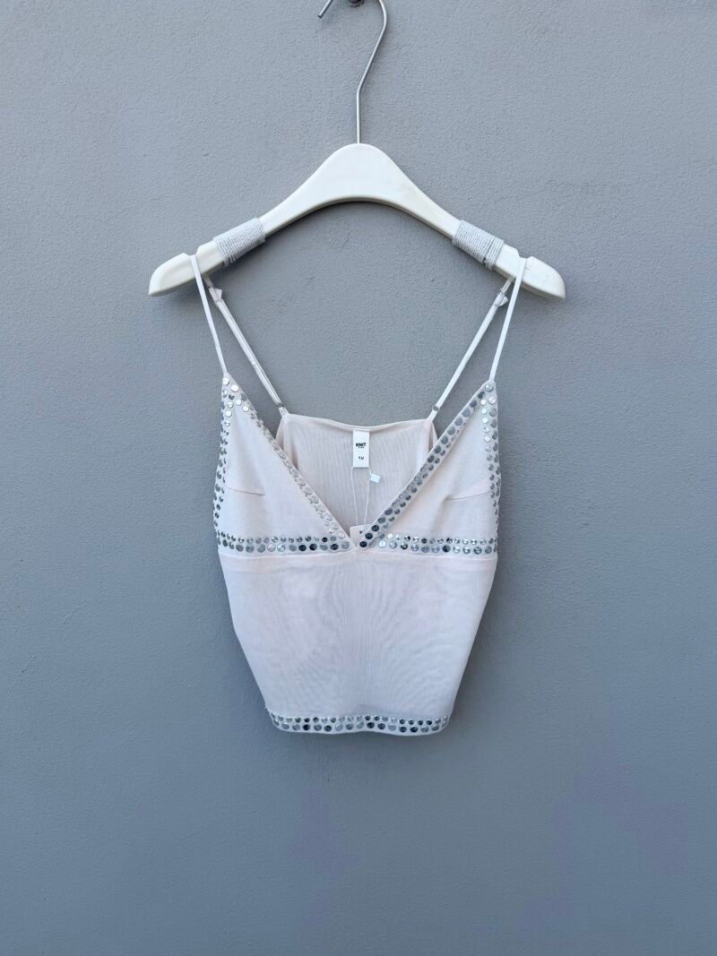 V022 - Top tachas
