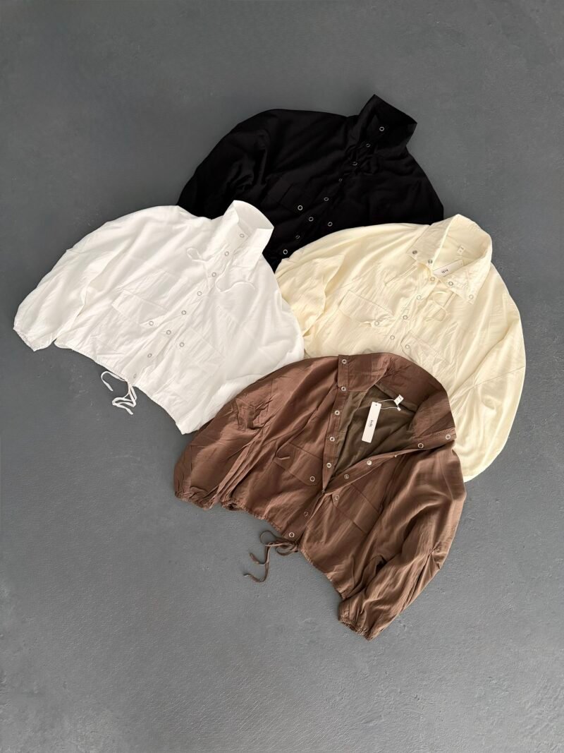 V157 - Campera globo c/ojal